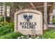 Royale Palms resort sign surrounded by greenery at 9994 Beach Club Dr. # 1604, Myrtle Beach, SC 29572