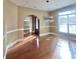 Dining room with hardwood floors, chandelier, and arched doorway at 1038 Johnston Dr., Myrtle Beach, SC 29588