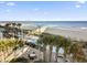 Aerial view of resort amenities including pools, beach, and ocean at 107 Ocean Blvd. S # 507, Myrtle Beach, SC 29577