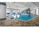 Indoor pool with a spa and fireplace at 107 Ocean Blvd. S # 507, Myrtle Beach, SC 29577
