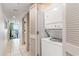 Stackable washer and dryer in a hallway closet at 107 Ocean Blvd. S # 507, Myrtle Beach, SC 29577
