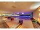 Bowling alley illuminated with neon lighting, ready for a game at 1105 S Ocean Blvd. # 830, Myrtle Beach, SC 29577