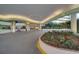 Covered hotel entrance with a circular driveway and landscaping at 1105 S Ocean Blvd. # 830, Myrtle Beach, SC 29577