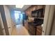 Compact kitchen with black appliances and granite countertops at 1105 S Ocean Blvd. # 830, Myrtle Beach, SC 29577