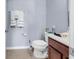 Small bathroom with toilet, sink, and dark wood vanity at 1857 Culbertson Ave. # 1857, Myrtle Beach, SC 29577