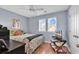 Bright bedroom with a queen-size bed and hardwood floors at 1857 Culbertson Ave. # 1857, Myrtle Beach, SC 29577