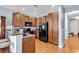 Modern kitchen with dark wood cabinets and black appliances at 1857 Culbertson Ave. # 1857, Myrtle Beach, SC 29577