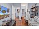 Cozy sitting area with a sofa, bookcase, and large TV at 1857 Culbertson Ave. # 1857, Myrtle Beach, SC 29577