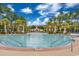 Resort-style community pool with palm trees at 1857 Culbertson Ave. # 1857, Myrtle Beach, SC 29577