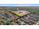 An aerial view of a residential community with a pool, sports field, and pond at 2005 Silvercrest Dr. # G-32, Myrtle Beach, SC 29579