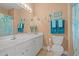 Clean and bright bathroom with beach-themed decor at 2005 Silvercrest Dr. # G-32, Myrtle Beach, SC 29579