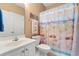 Whimsical bathroom with fun, beach-themed shower curtain at 2005 Silvercrest Dr. # G-32, Myrtle Beach, SC 29579