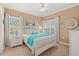 Inviting bedroom with white furniture and beach-themed decor at 2005 Silvercrest Dr. # G-32, Myrtle Beach, SC 29579