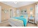 Bright, beach-themed bedroom with ensuite bathroom access at 2005 Silvercrest Dr. # G-32, Myrtle Beach, SC 29579