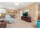 Living area with entertainment center and dining area in the background at 2005 Silvercrest Dr. # G-32, Myrtle Beach, SC 29579