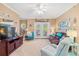 Coastal-themed living room with comfortable seating and a balcony at 2005 Silvercrest Dr. # G-32, Myrtle Beach, SC 29579