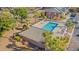 Aerial view of community pool surrounded by palm trees and a pool house at 2005 Silvercrest Dr. # G-32, Myrtle Beach, SC 29579