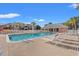 Inviting community pool with lounge chairs, a covered area, and a white picket fence at 2005 Silvercrest Dr. # G-32, Myrtle Beach, SC 29579