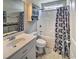 Neat bathroom with a tub, vanity, and updated fixtures at 2707 Wood Creek Ln., Conway, SC 29527