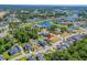 Bird's-eye view of a residential neighborhood with a clear lot marked, showcasing its location at 3072 Moss Bridge Ln., Myrtle Beach, SC 29579