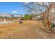 Large backyard with pond and fire pit views at 317 Goddard Ln., Murrells Inlet, SC 29576