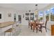 Charming dining area with a wood table and ample natural light at 317 Goddard Ln., Murrells Inlet, SC 29576