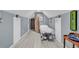 Massage table in a tranquil hallway setting at 317 Goddard Ln., Murrells Inlet, SC 29576