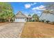 Charming house with a brick paved driveway at 317 Goddard Ln., Murrells Inlet, SC 29576