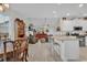 Open concept kitchen with white cabinets, granite countertops, and island at 317 Goddard Ln., Murrells Inlet, SC 29576