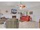 Bright living room with a fireplace, hardwood floors, and comfortable seating at 317 Goddard Ln., Murrells Inlet, SC 29576