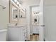 Clean bathroom with white vanity, updated fixtures, and a shower/tub combo at 415 Ocean Creek Dr. # 2236, Myrtle Beach, SC 29572