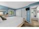 Spacious bedroom with light wood bed frame and built in closet at 415 Ocean Creek Dr. # 2236, Myrtle Beach, SC 29572
