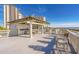 Relaxing rooftop deck with ocean views and bar at 415 Ocean Creek Dr. # 2236, Myrtle Beach, SC 29572