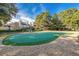 Community putting green surrounded by trees and condos at 415 Ocean Creek Dr. # 2236, Myrtle Beach, SC 29572