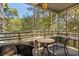 Enjoy the outdoors on this screened porch with table and chairs at 415 Ocean Creek Dr. # 2236, Myrtle Beach, SC 29572