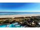 Aerial view of oceanfront resort with pools and beach access at 4800 S Ocean Blvd. # 611, North Myrtle Beach, SC 29582