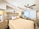 Bedroom with a queen bed and light wood furniture at 4800 S Ocean Blvd. # 611, North Myrtle Beach, SC 29582