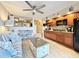 Living room with kitchen and breakfast bar at 4800 S Ocean Blvd. # 611, North Myrtle Beach, SC 29582