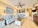 Living room with kitchen and breakfast bar at 4800 S Ocean Blvd. # 611, North Myrtle Beach, SC 29582