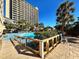 Resort pool and deck area with walkway at 4800 S Ocean Blvd. # 611, North Myrtle Beach, SC 29582