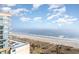Aerial view of beachfront property, showcasing beach access and boardwalk at 5200 N Ocean Blvd. # 1134, Myrtle Beach, SC 29577