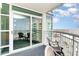 Private balcony showcasing ocean and city views, with sliding glass doors at 5200 N Ocean Blvd. # 1134, Myrtle Beach, SC 29577