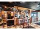 Indoor bar with wooden finishes and comfortable barstools at 5200 N Ocean Blvd. # 1134, Myrtle Beach, SC 29577