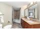 Bathroom with double vanity and separate shower and tub at 5200 N Ocean Blvd. # 1134, Myrtle Beach, SC 29577