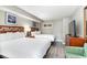 Main bedroom with two double beds and wood accents at 5300 N Ocean Blvd. # 1011, Myrtle Beach, SC 29577