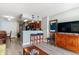 Living room with kitchen bar and ocean view at 5300 N Ocean Blvd. # 1011, Myrtle Beach, SC 29577