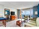 Living room with ocean view and access to balcony at 5300 N Ocean Blvd. # 1011, Myrtle Beach, SC 29577