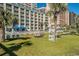 Relaxing pool area with lounge chairs at 5300 N Ocean Blvd. # 1011, Myrtle Beach, SC 29577