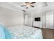 Main bedroom with calming decor, wood floors, and a ceiling fan at 6001 - 5326 S Kings Hwy., Myrtle Beach, SC 29575