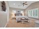 Spacious Primary bedroom with a king-size bed and plenty of natural light at 613 Lee Ave., Murrells Inlet, SC 29576